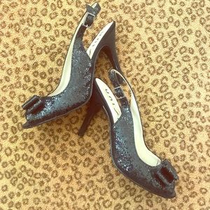 Black sparkle bow sling backs